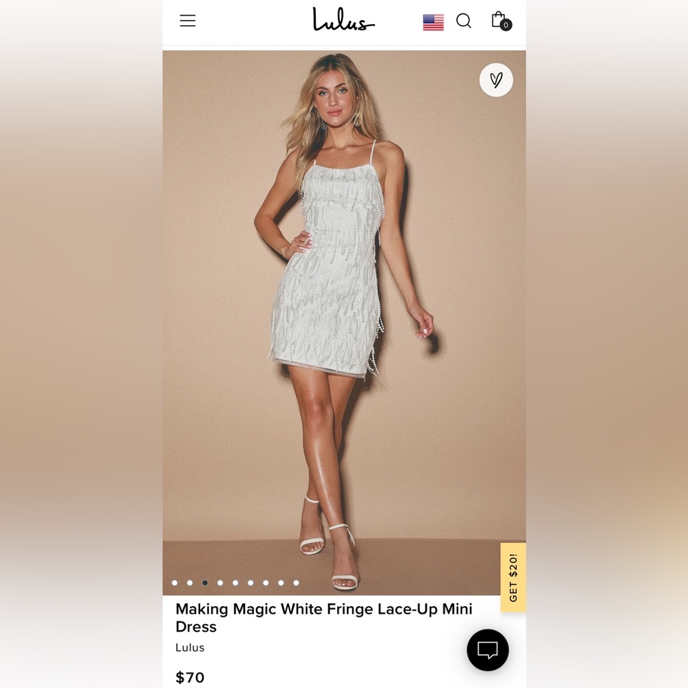 “Making Magic White Fringe Lace-Up Mini” dress from Lulus